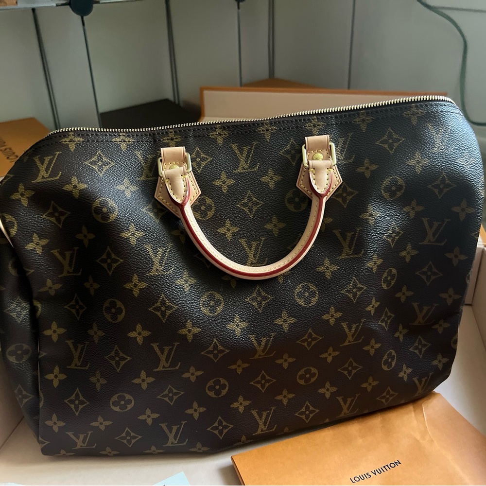 Louis Vuitton Brown Satchel with Monogram Design